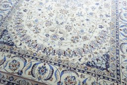 Close-up detail of 2000s Nain rug from Iran / Persia showing Wool weave