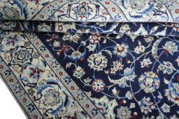 Close-up detail of 2000s Nain rug from Iran / Persia showing Wool weave