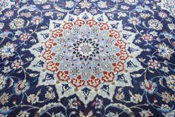 Central medallion detail of 2000s Nain rug from Iran / Persia