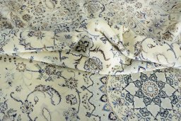 Surface texture of New Nain rug with natural Wool and intricate pattern