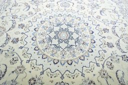 Central medallion detail of New Nain rug from Iran / Persia