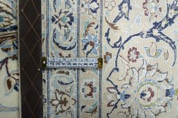 Central medallion detail of New Nain rug from Iran / Persia