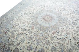 Backside of handmade New Nain rug showing knot structure and weave density