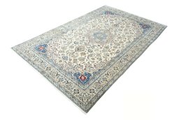 Corner detail of New Nain rug showing border pattern and Cork pile