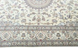 Corner detail of 2000s Nain rug showing border pattern and Cork pile