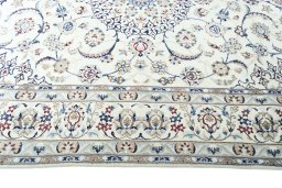 Corner detail of New Nain rug showing border pattern and Wool pile