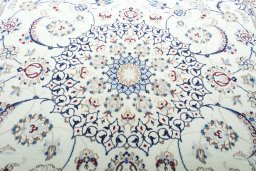Central medallion detail of New Nain rug from Iran / Persia