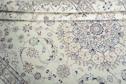 Close-up detail of New Nain rug from Iran / Persia showing Wool weave