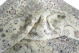 Surface texture of New Nain rug with natural Wool and intricate pattern