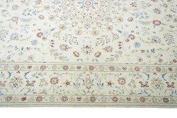 Corner detail of New Nain rug showing border pattern and Wool pile