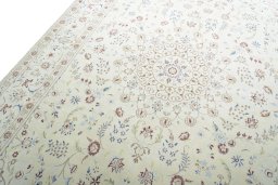 Backside of handmade New Nain rug showing knot structure and weave density