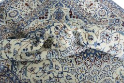 Surface texture of New Nain rug with natural Wool and intricate pattern