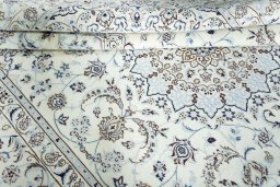 Close-up detail of New Nain rug from Iran / Persia showing Wool weave