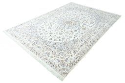 Corner detail of New Nain rug showing border pattern and Wool pile