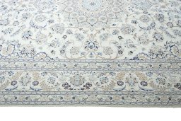 Corner detail of New Nain rug showing border pattern and Wool pile