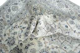 Surface texture of New Nain rug with natural Wool and intricate pattern