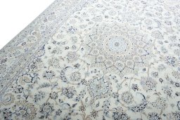 Backside of handmade New Nain rug showing knot structure and weave density