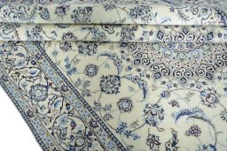 Close-up detail of New Nain rug from Iran / Persia showing Wool weave