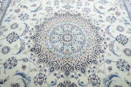 Central medallion detail of New Nain rug from Iran / Persia