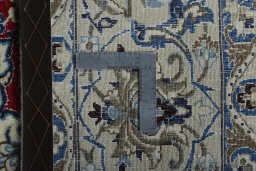 Backside of handmade 2000s Nain rug showing knot structure and weave density