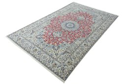 Corner detail of 2000s Nain rug showing border pattern and Wool pile