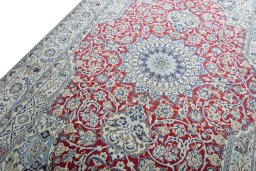 Backside of handmade 2000s Nain rug showing knot structure and weave density