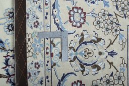 Surface texture of New Nain rug with natural Wool and intricate pattern
