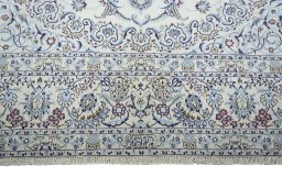 Close-up detail of New Nain rug from Iran / Persia showing Wool weave