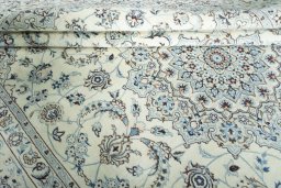 Close-up detail of New Nain rug from Iran / Persia showing Wool weave