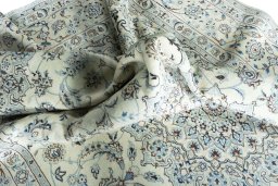 Surface texture of New Nain rug with natural Wool and intricate pattern