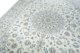 Backside of handmade New Nain rug showing knot structure and weave density