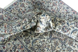 Surface texture of New Nain rug with natural Wool and intricate pattern