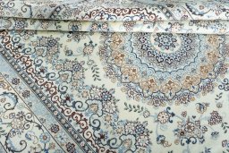 Close-up detail of New Nain rug from Iran / Persia showing Wool weave