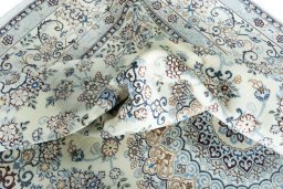 Surface texture of New Nain rug with natural Wool and intricate pattern