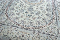 Close-up detail of New Nain rug from Iran / Persia showing Wool weave