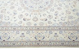 Corner detail of New Nain rug showing border pattern and Cork pile