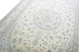 Backside of handmade New Nain rug showing knot structure and weave density