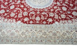 Corner detail of New Nain rug showing border pattern and Cork pile