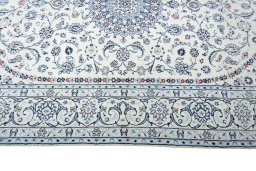 Corner detail of New Nain rug showing border pattern and Wool pile
