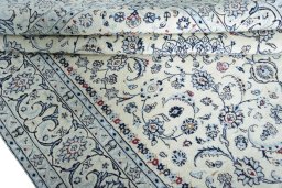 Close-up detail of New Nain rug from Iran / Persia showing Wool weave