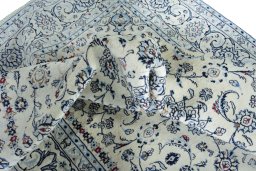 Surface texture of New Nain rug with natural Wool and intricate pattern