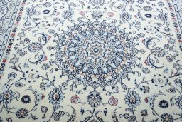 Central medallion detail of New Nain rug from Iran / Persia