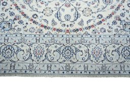 Full view of New Nain rug from Iran / Persia, 278 × 199 cm in Beige tones