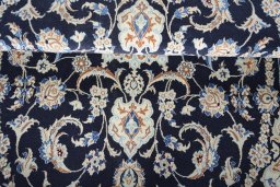 Close-up detail of New Nain rug from Iran / Persia showing Wool weave