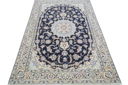 Surface texture of New Nain rug with natural Wool and intricate pattern