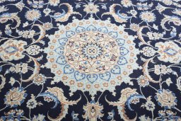 Central medallion detail of New Nain rug from Iran / Persia