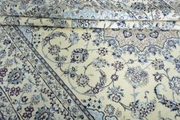 Close-up detail of New Nain rug from Iran / Persia showing Wool weave