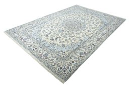 Corner detail of New Nain rug showing border pattern and Wool pile