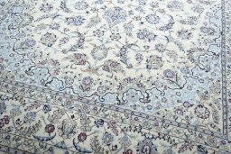 Close-up detail of New Nain rug from Iran / Persia showing Wool weave