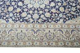 Corner detail of New Nain rug showing border pattern and Wool pile